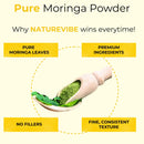 Wooden scoop with moringa powder and moringa leaves, highlighting pure superfood supplement.