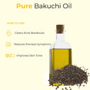 Glass bottle of pure Bakuchi oil with bakuchi seeds, skincare benefits listed beside bottle