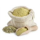 Bulk fennel seed powder in burlap sack with whole seeds and wooden scoop on white background